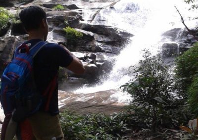 By a waterfall, Doi Inthanon