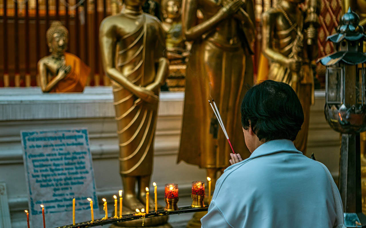 Songkran praying at a temple